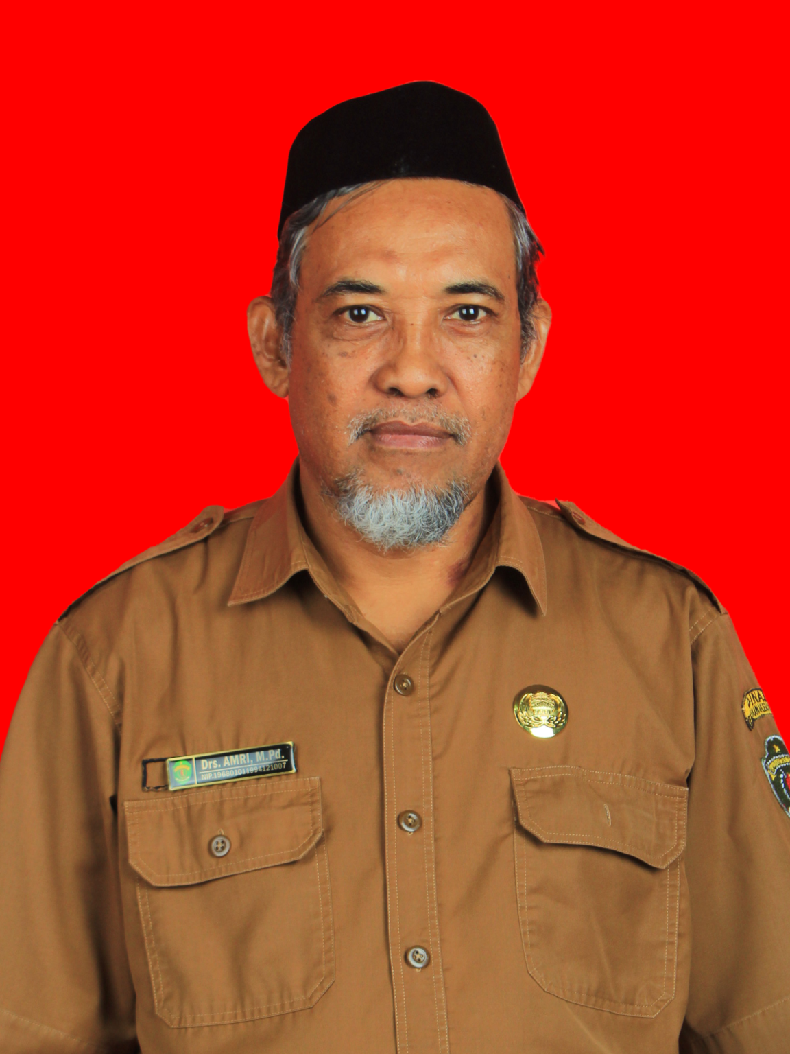 Drs. Amri, M.Pd.