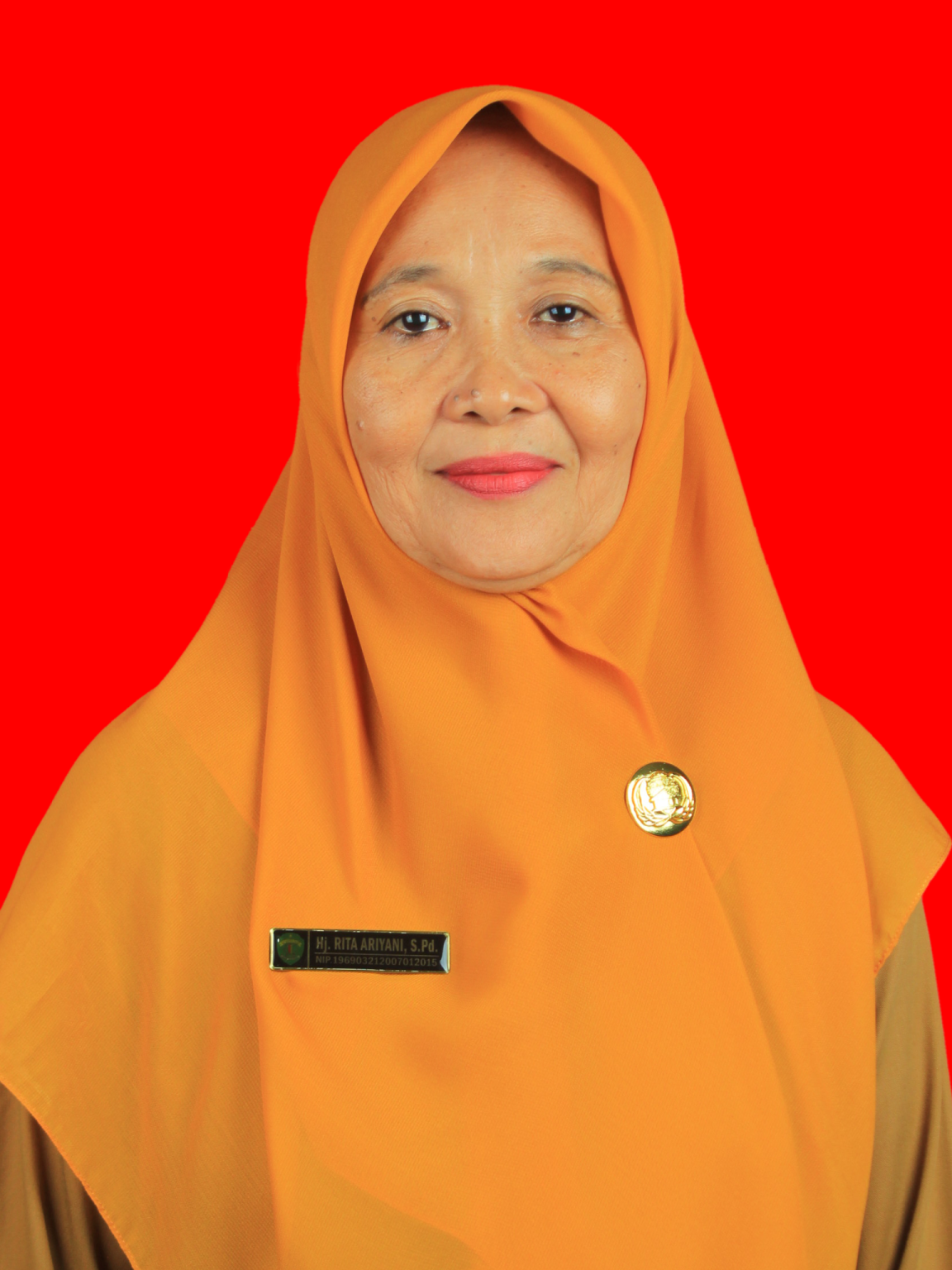 Hj. Rita Ariyani, S.Pd